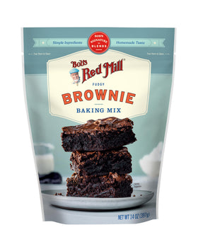 Whisking Bob's Red Mill Signature Brownie batter in a bowl for tender texture
