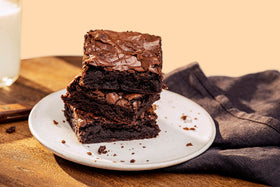 Bob's Red Mill Signature Brownie cooling on rack, invitingly chocolaty