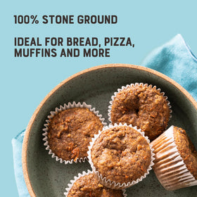 Measuring cup with Bob's Red Mill flour for muffins and cookies.