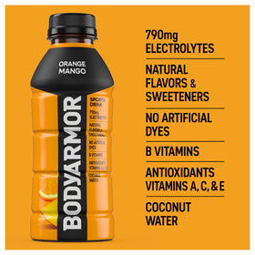 Pouring BodyArmor Orange Mango into a glass for quick hydration.