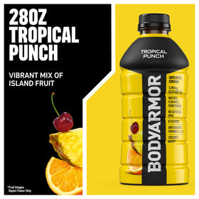 BODYARMOR Tropical Punch bottle with glass emphasizes refreshing flavor after training