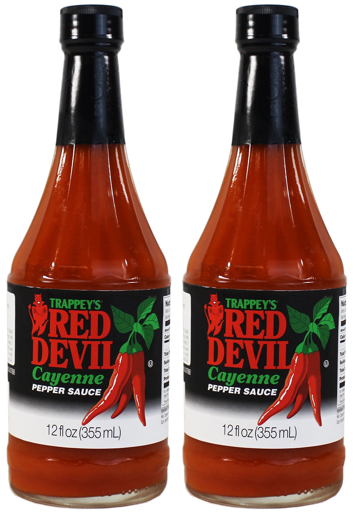 Boiyiklonn Trappey's Red Devil hot sauce being poured for a bold flavor boost.