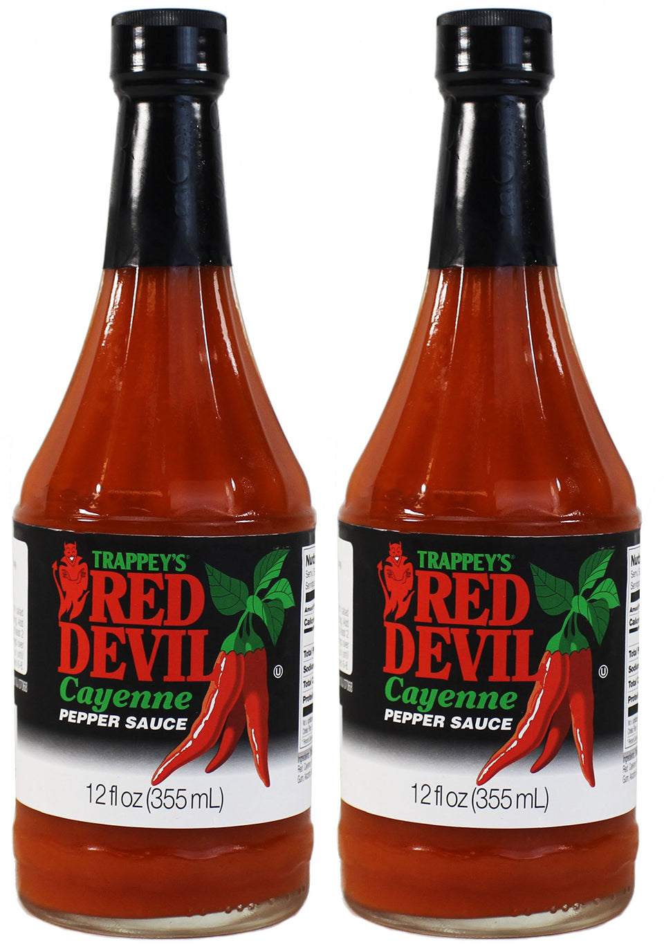 Boiyiklonn Trappey's Red Devil hot sauce being poured for a bold flavor boost.
