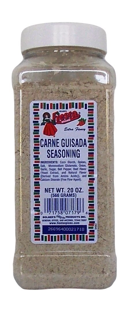 Bolner's Fiesta Carne Guisada Seasoning bottle pour showcases rich flavor for quick beef dishes.