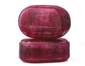 Bonds of London liquorice centre close-up—soft interior contrasts with fruity blackcurrant flavor.