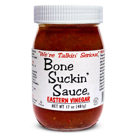 Bone Suckin' bottle pour shows tangy Carolina flavor on grilled meat.