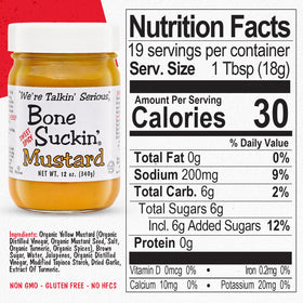 Pouring Bone Suckin' Sweet Spicy Mustard for grilling