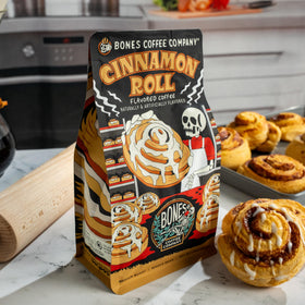 Bones Coffee Cinnamon Roll Decaf brew in mug ready to sip