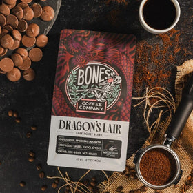 Steam rises from a Bones Dragon's Lair cup, hinting at bold aroma.