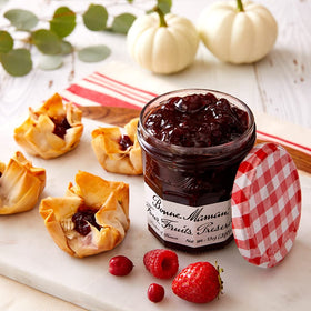 Bonne Maman Four Fruit Preserves glass jar close-up, perfect for toppings and desserts.