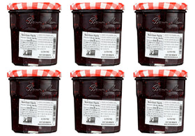 Bonne Maman Four Fruit Preserves spread on toast, versatile morning treat.