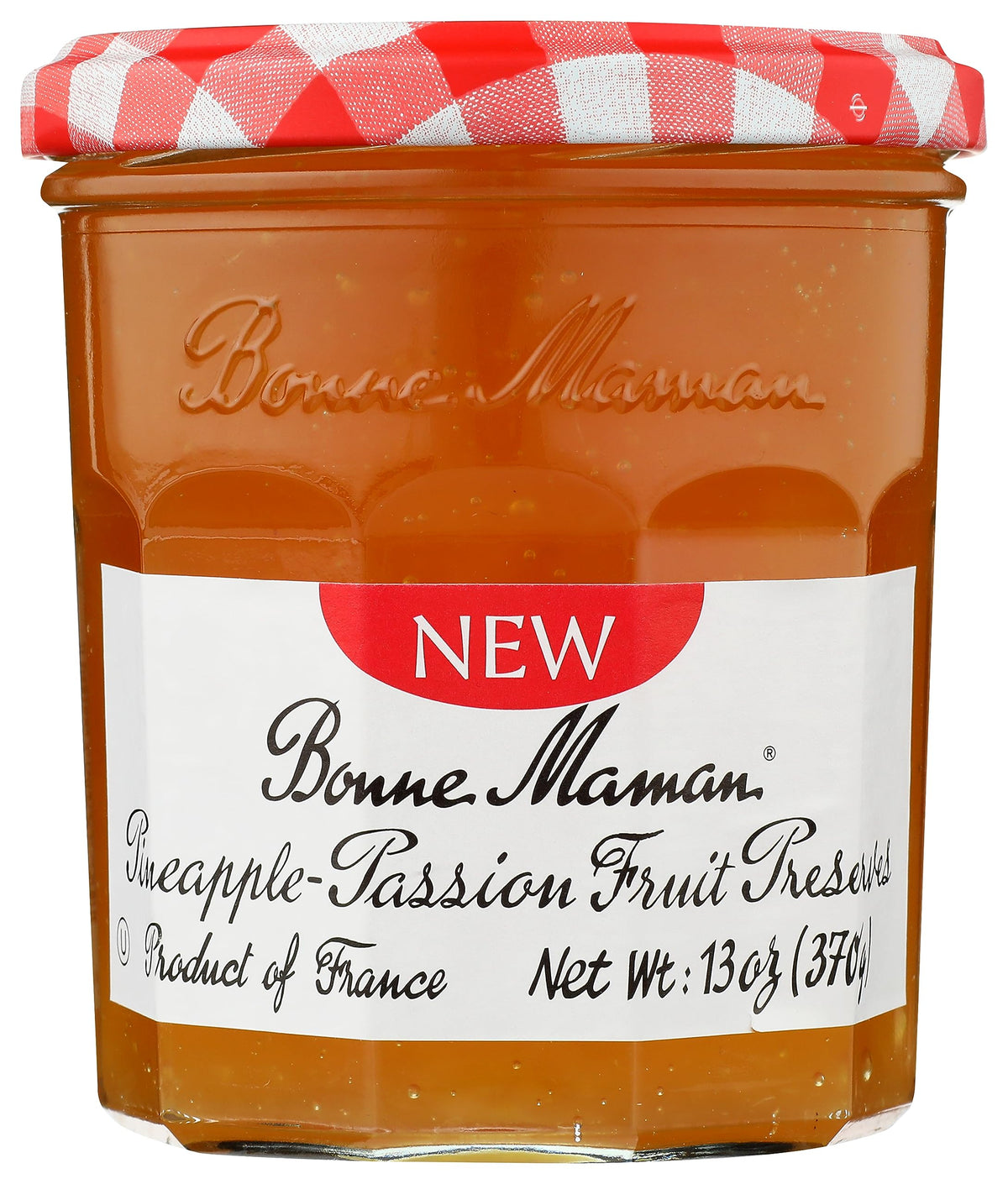 Bonne Maman Mango-Peach Preserves spooned over creamy yogurt.