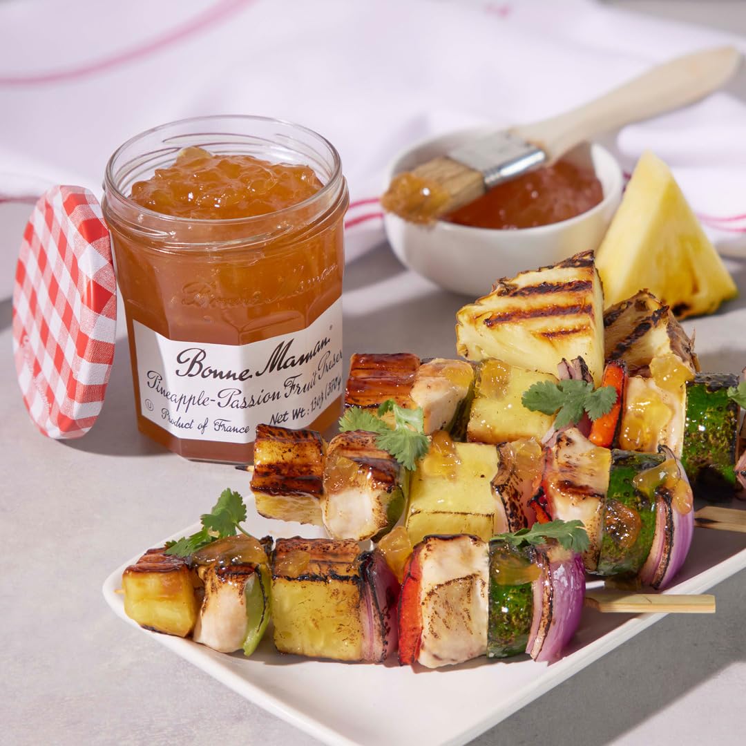 Bonne Maman Mango-Peach Preserves spread on toast for a cheerful morning.