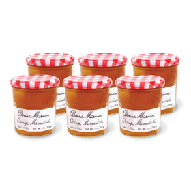 Bonne Maman orange marmalade jars in a six-pack, ideal for breakfast sharing.
