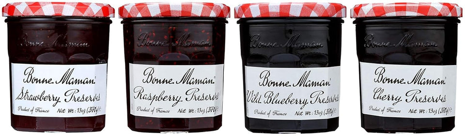 Bonne Maman strawberry jar on toast, bright fruit flavor for a homemade breakfast.