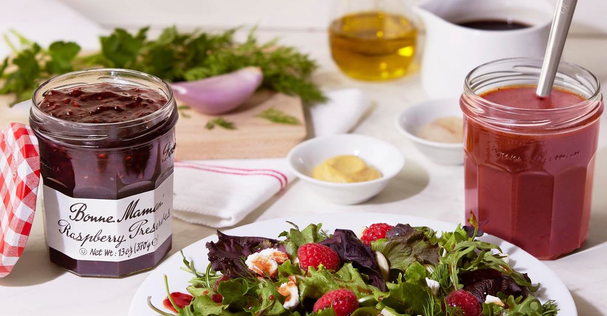 Bonne Maman wild blueberry jar with yogurt, ripe fruit sweetness elevates a snack.