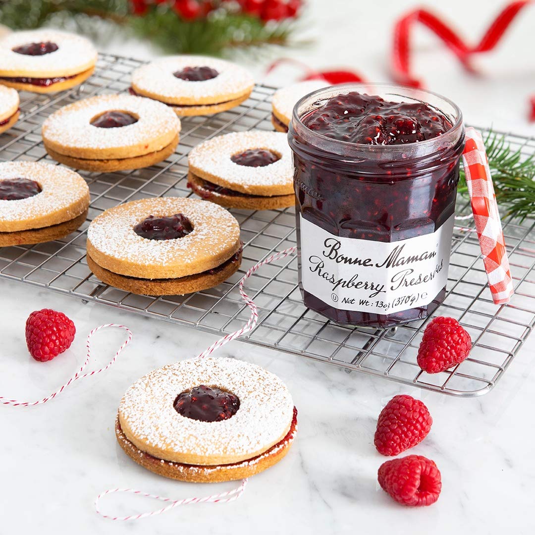 Bonne Maman Raspberry Preserves label and glass jar, premium pantry addition.