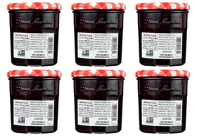 Bonne Maman Raspberry Preserves open jar with spoon, ideal for quick breakfast topping.