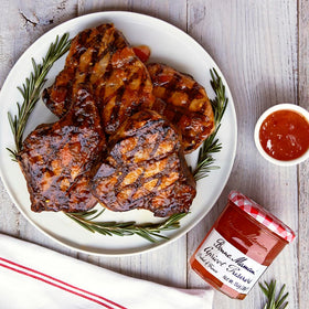 Bonne Maman Strawberry Preserves jar highlighting whole fruit in a vibrant glaze for toast.
