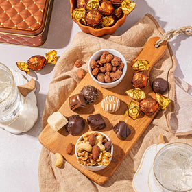 Bonnie and Pop embossed keepsake tin detail, keepsake presentation after enjoying treats.