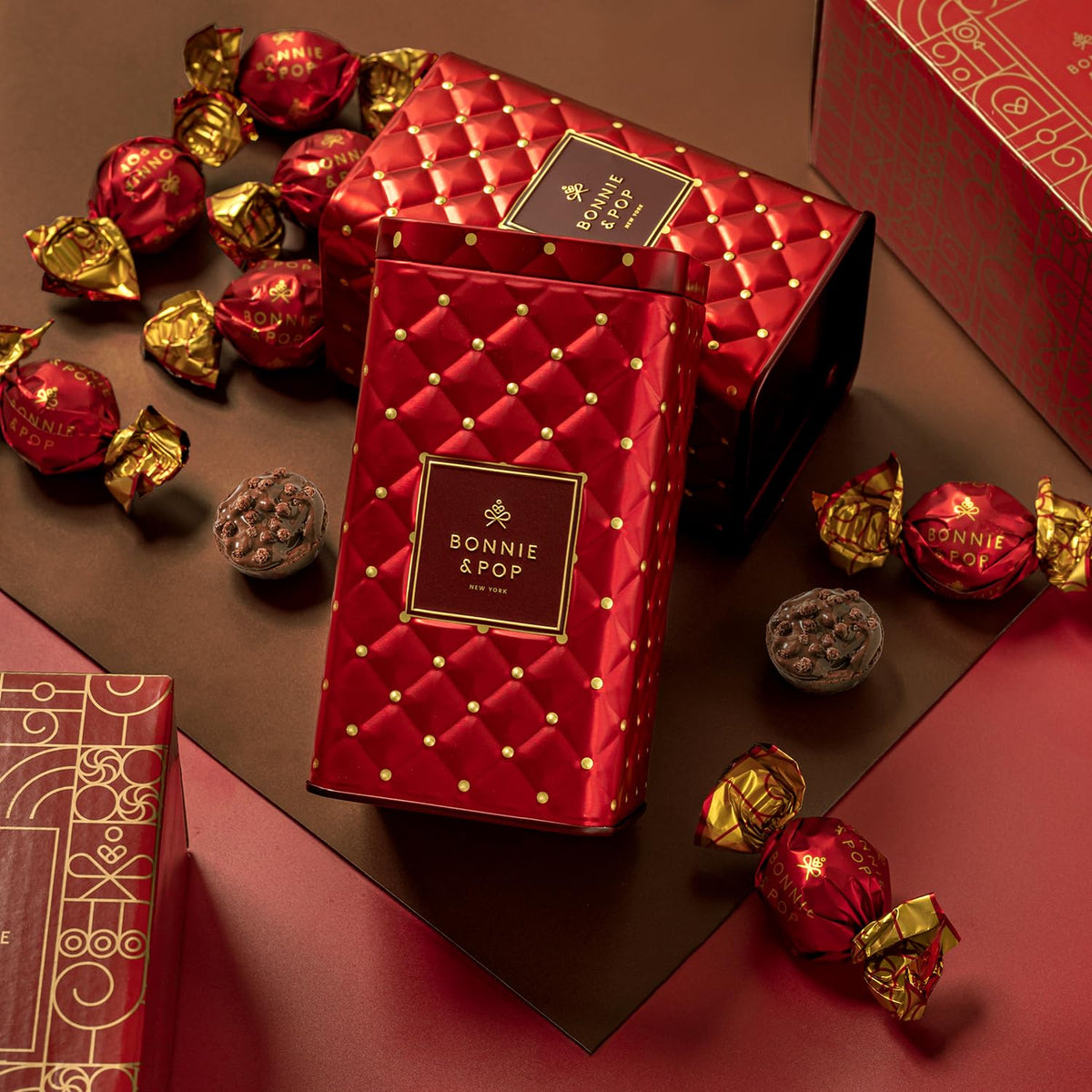 Bonnie and Pop red keepsake tin opened, reveals chocolates
