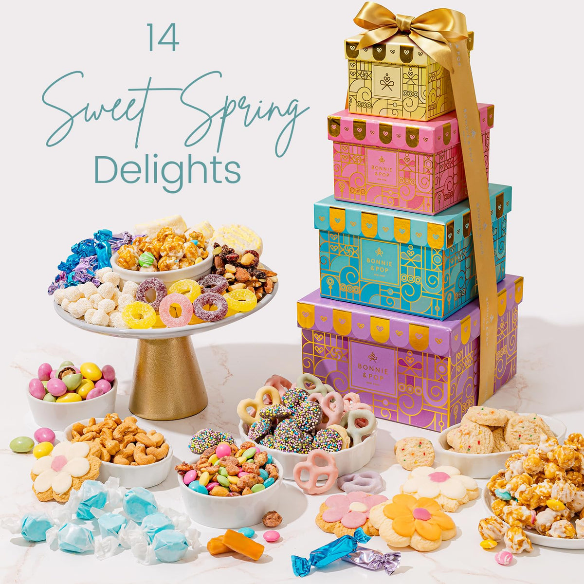 Bonnie and Pop Spring Gift Tower snacks closeup, featuring cookies, popcorn, and nuts for variety.