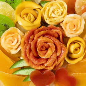 Bonnie and Pop tropical fruit assortment with cantaloupe, papaya, and kiwi for refreshing snacks.