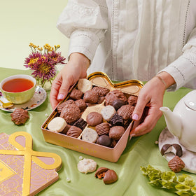 Bonnie and Pop cashew clusters in a glossy chocolate snack scene.