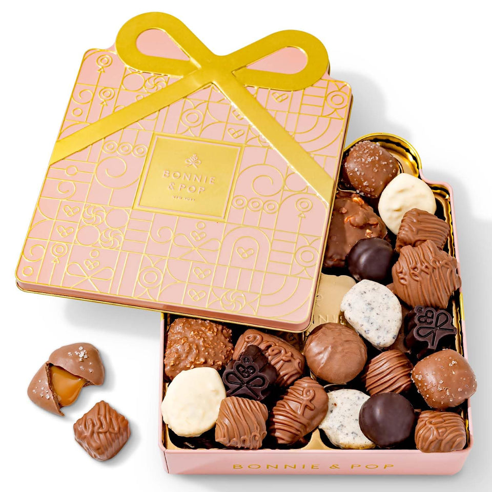 Bonnie and Pop Mothers Day pink gift tin showcasing an elegant chocolate assortment for gifting.
