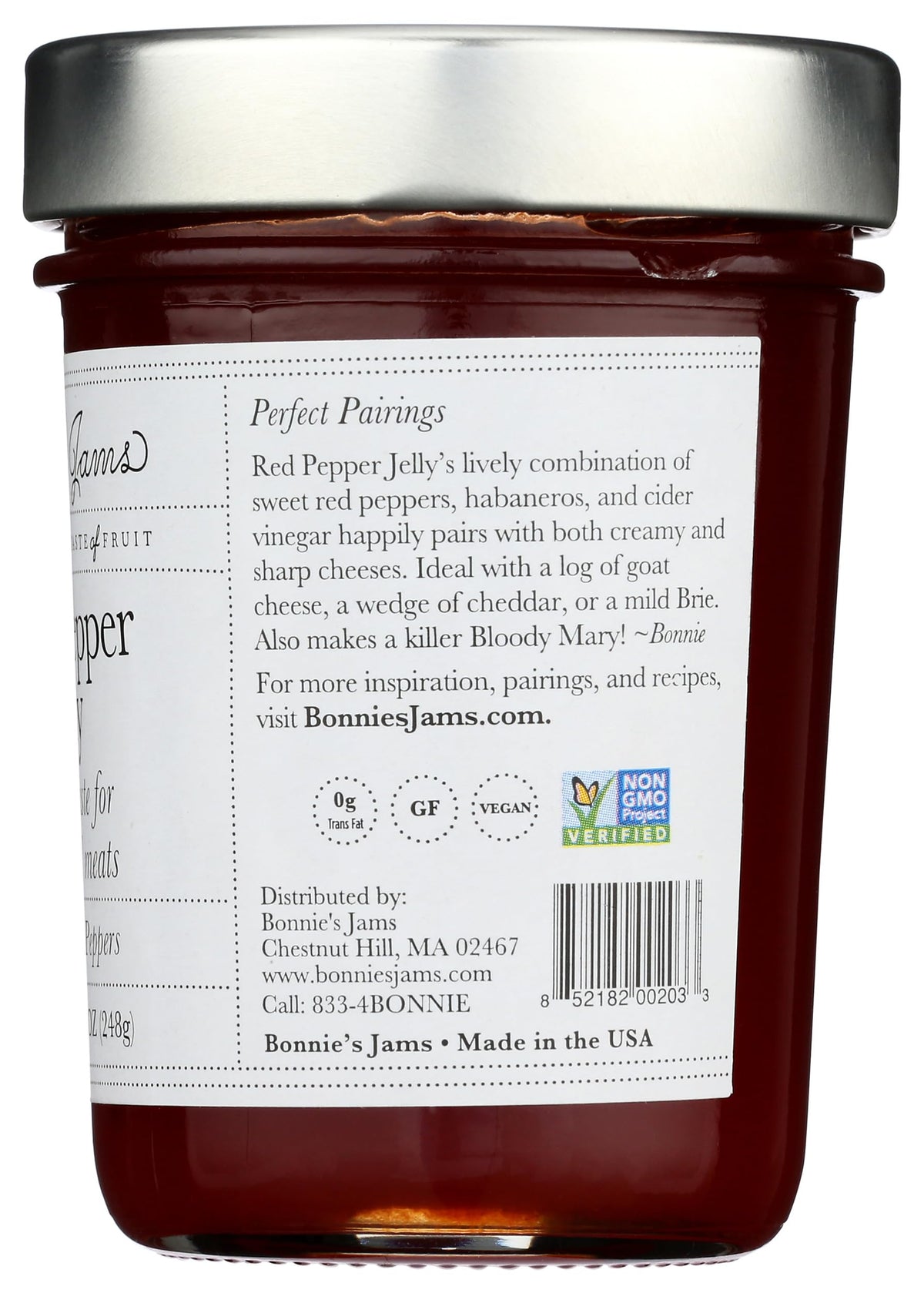 Cream cheese and jelly on a cracker with Bonnie's Jams Red Pepper Jelly.