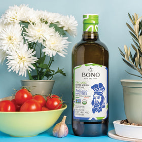 Bono Organic Olive Oil pour over salad showing finishing use