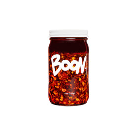 Boon Sauce Chili Oil bottle ready to pour for bold heat and umami.