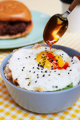 Boon Sauce Chili Oil poured over noodles to boost flavor and heat.