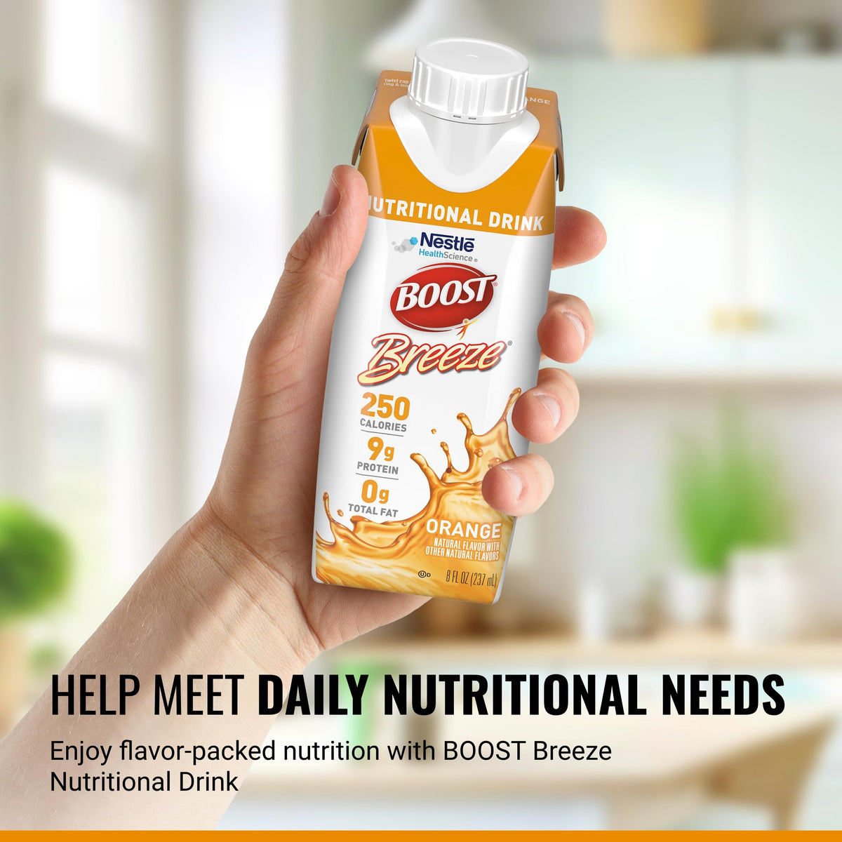 BOOST Breeze Clear orange bottle being poured highlights easy, refreshing nutrition on the go