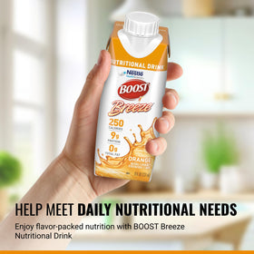 BOOST Breeze Clear orange bottle being poured highlights easy, refreshing nutrition on the go