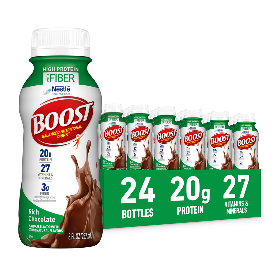 BOOST High Protein with Fiber bottle chocolate pour, showcasing creamy texture for on-the-go nutrition.