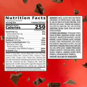 BOOST High Protein with Fiber glass pour showing smooth, chocolatey texture.