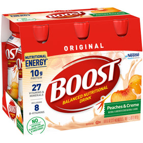 Pouring BOOST Original Peaches & Creme for a convenient morning energy boost