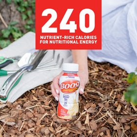 BOOST Original Vanilla being poured into a glass with creamy texture