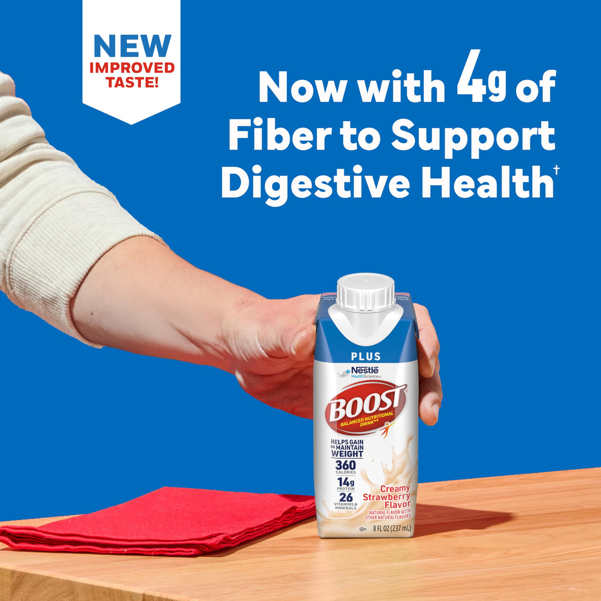 BOOST Plus 24-pack cartons stacked for bulk value.