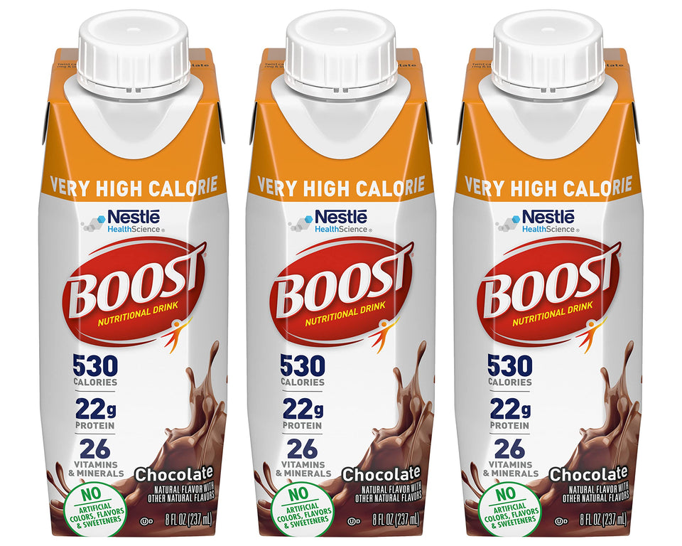 BOOST Very High Calorie Drink vanilla pour shows creamy texture for a quick snack