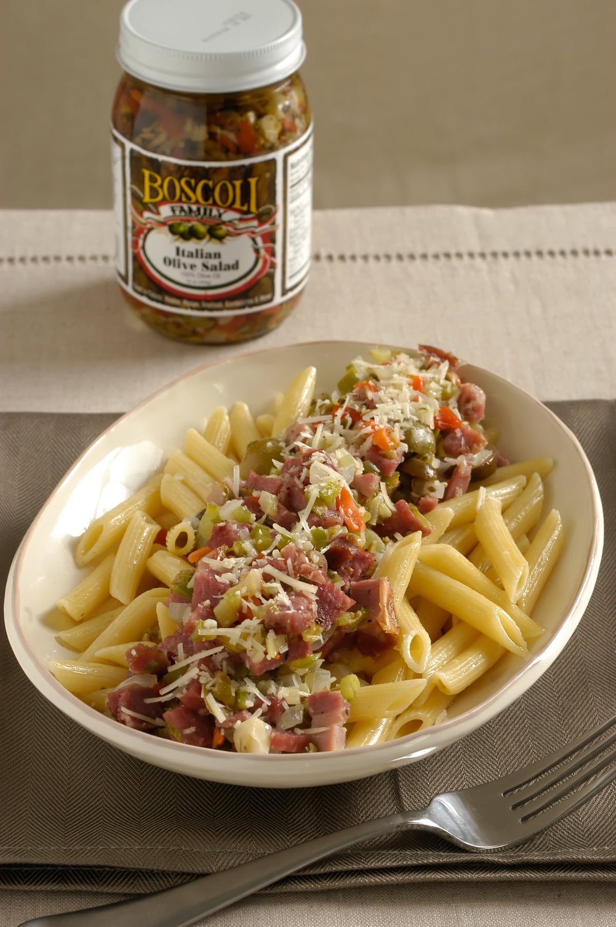 Boscoli Family Olive Salad pasta-dish, quick toss adds savory depth