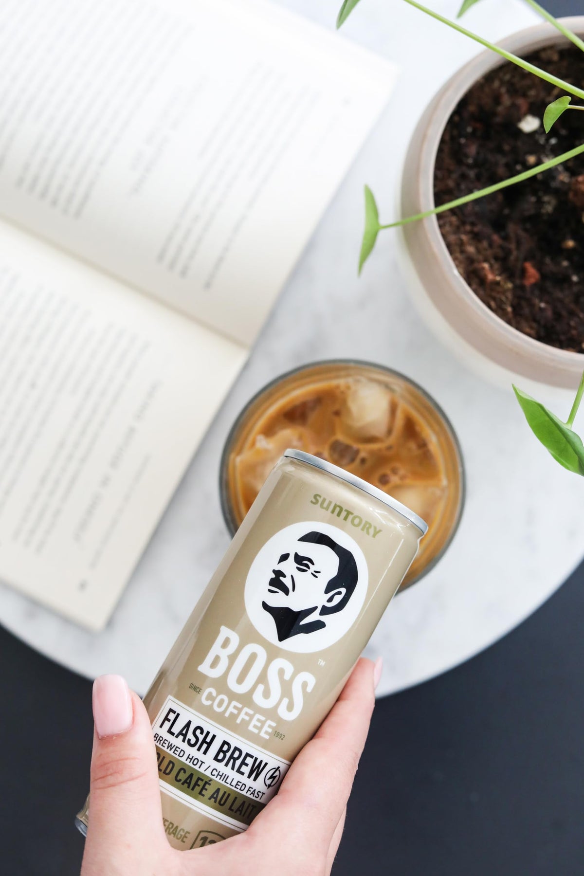 BOSS Coffee flash-brew can side displays convenient on-the-go caffeine for busy days.