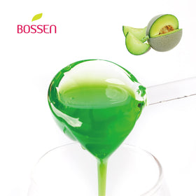 Glass of beverage flavored with Bossen Honeydew Syrup