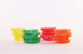 Boston Fruit Slices Round 11-Ounce flavors assortment shows lemon, lime, cherry, orange