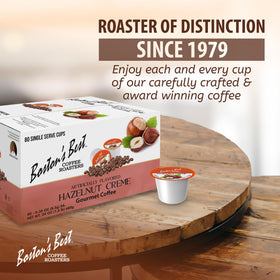 Boston's Best hazelnut creme K-Cup on a saucer ready to enjoy.