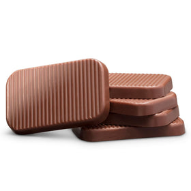 Bouchard Belgian Milk Chocolate on a desk, ready for a quick treat