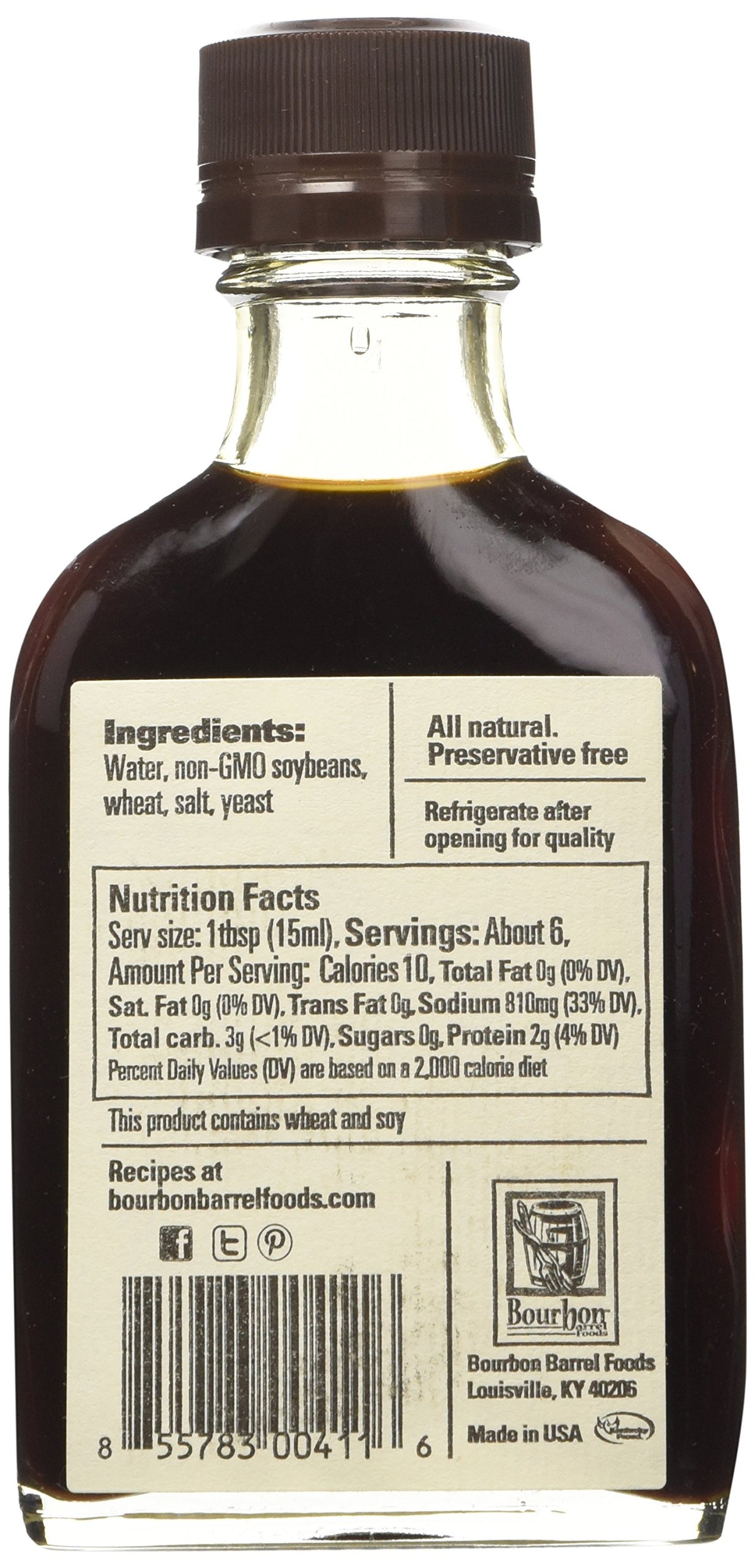 Bluegrass Soy Sauce bottle being poured, showcasing rich color and versatility.