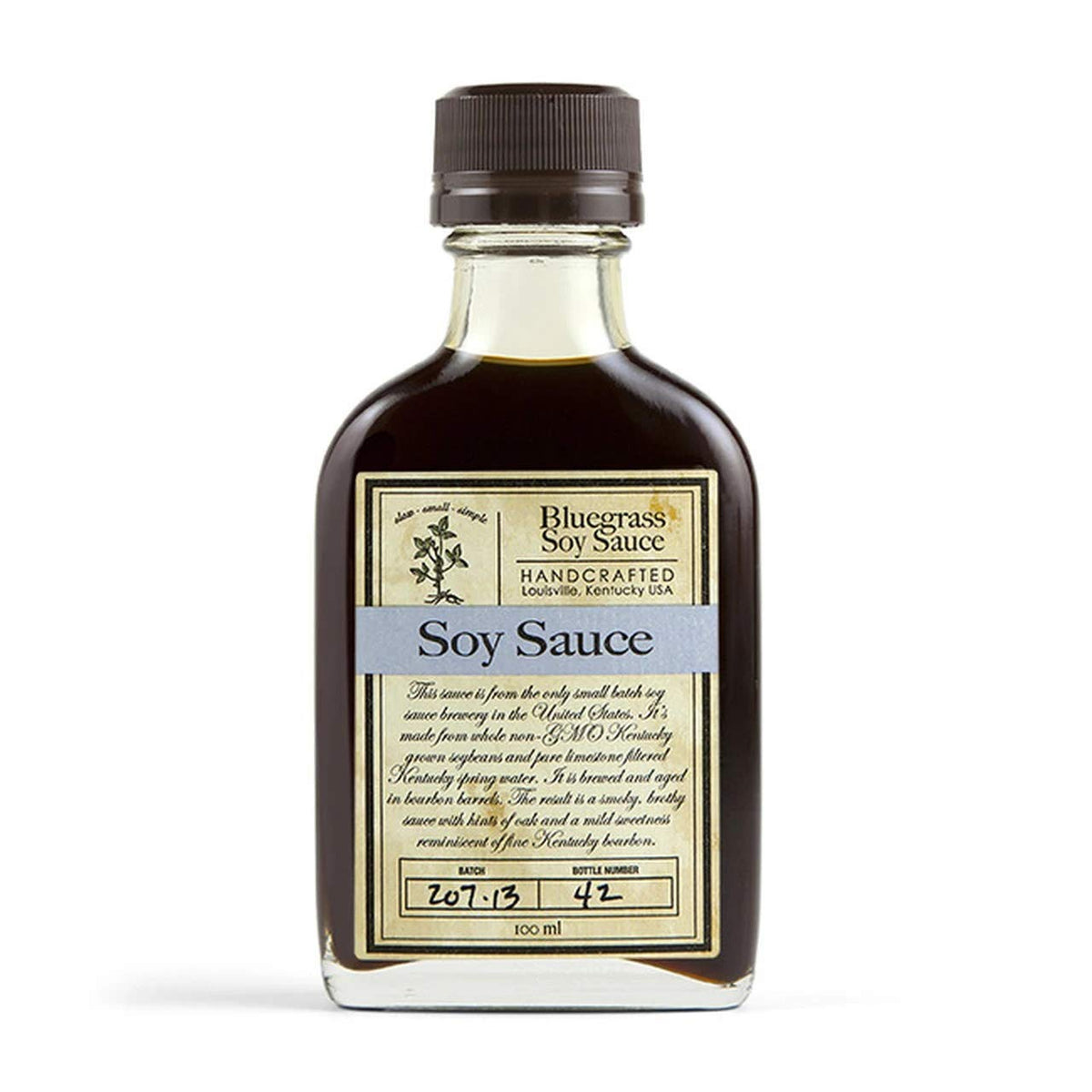 Bluegrass Soy Sauce bottle highlighting smoky, brothy notes and Kentucky heritage for cooking and finishing dishes.