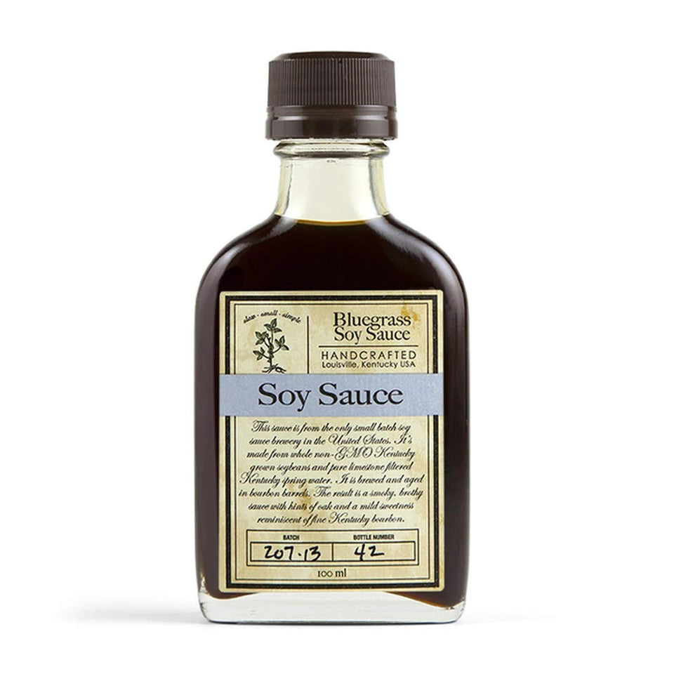 Bluegrass Soy Sauce bottle highlighting smoky, brothy notes and Kentucky heritage for cooking and finishing dishes.